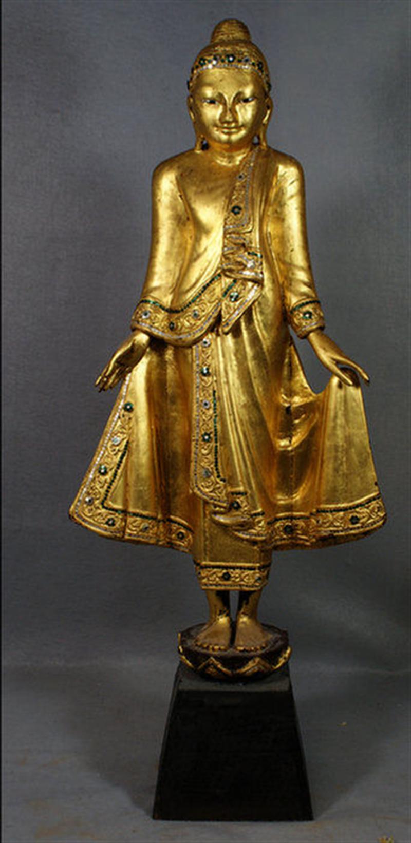 Carved gilt wood Asian figure of a woman,