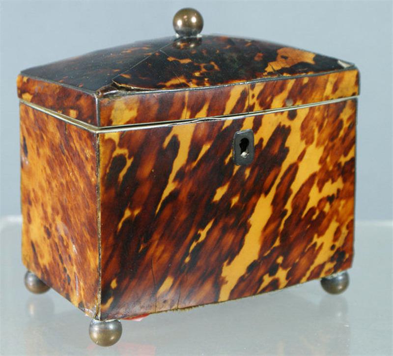 Silver and ivory inlaid tortoise shell
