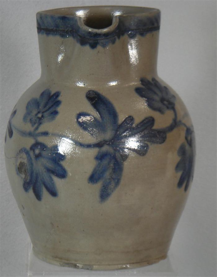 Blue decorated stoneware pitcher, strong