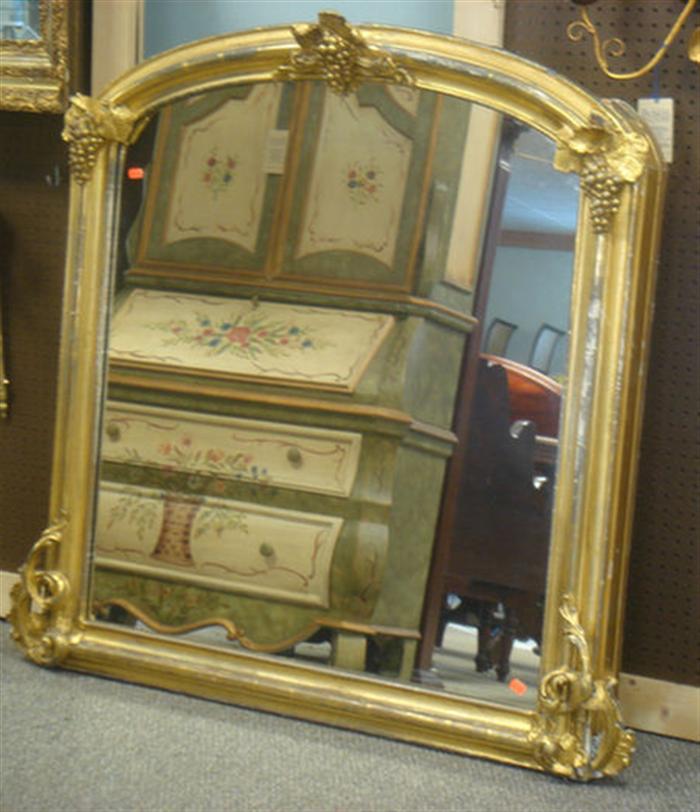 Gilt overmantle mirror with grape