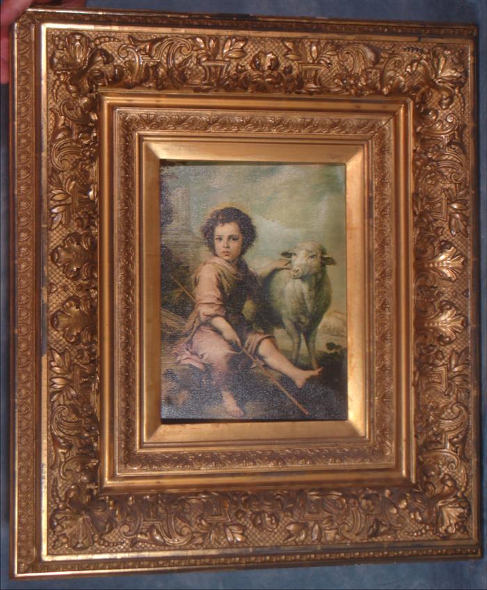 Ornate gilt plaster frame, young