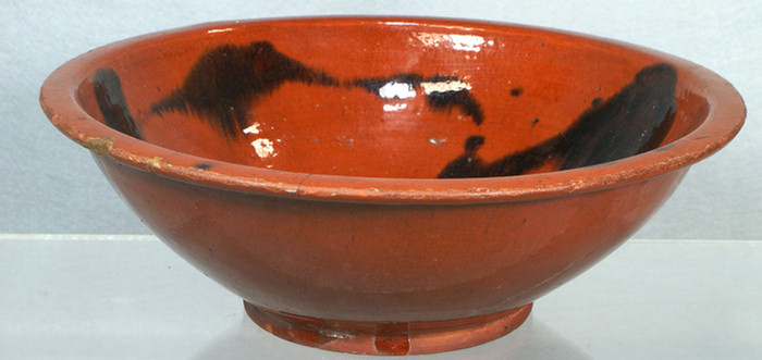 Glazed redware mixing bowl with manganese