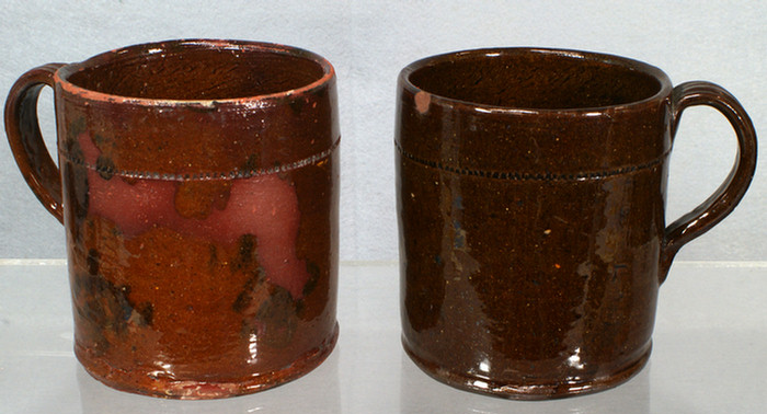  2 glazed redware mugs one with 3da59