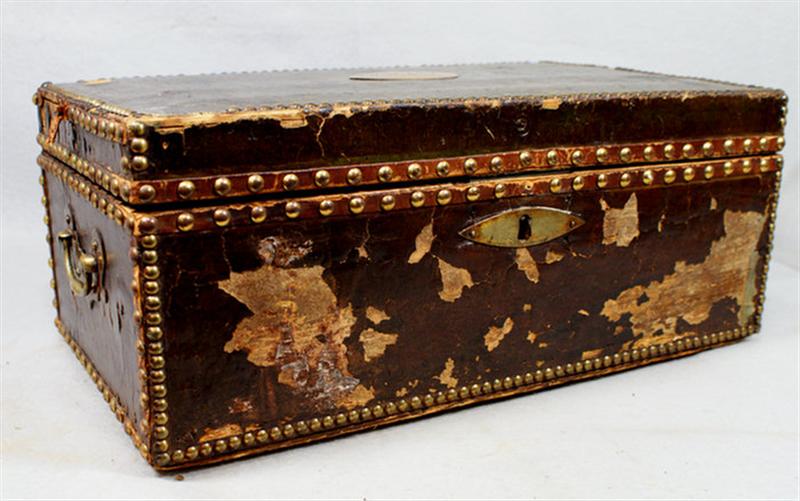 Leather covered valuables trunk,