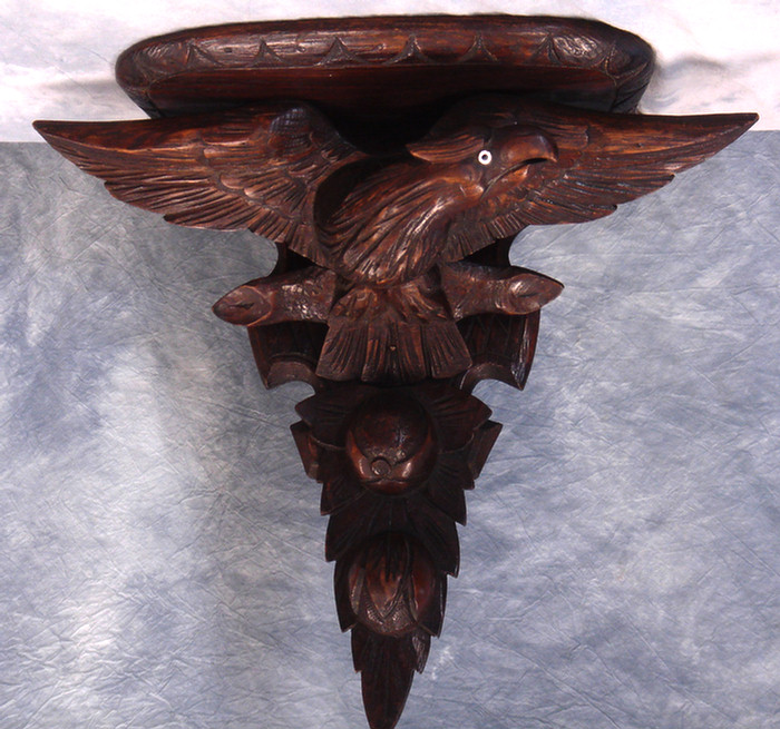 Carved chestnut spread wing eagle