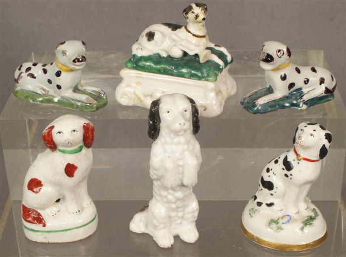 5 miniature dog figurines 1 covered 3de21