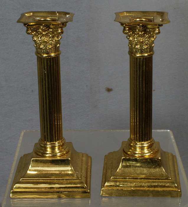 Pr of Corinthian column brass candlesticks,