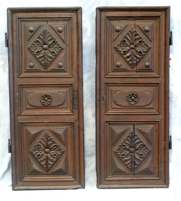 Pair of carved oak armoire doors,