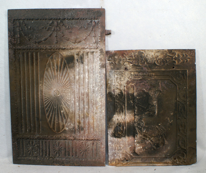 2 iron fireplace backs, one depicting