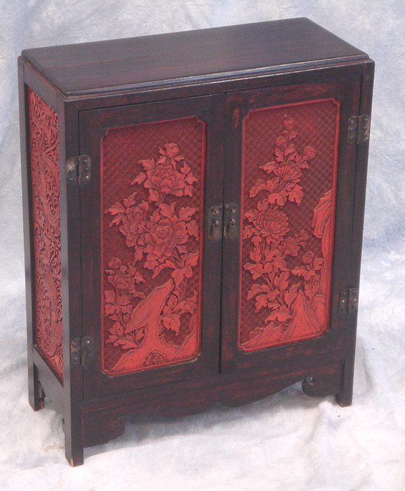 Chinese 2 door cabinet with carved