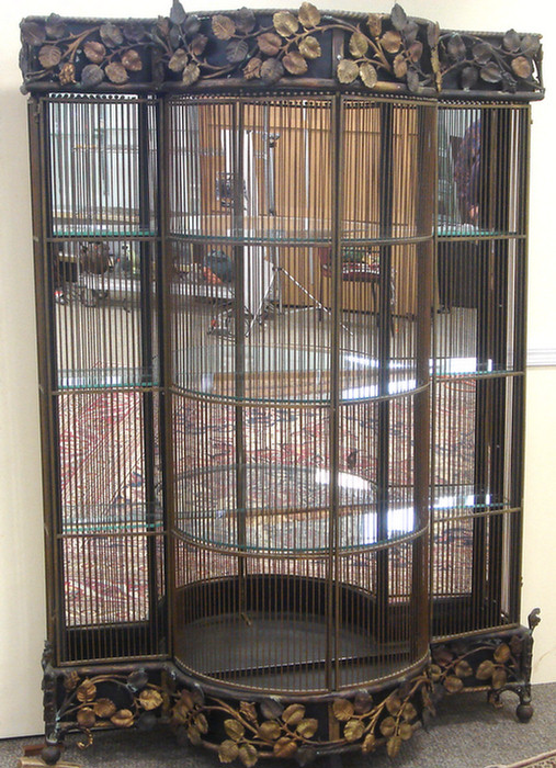 Mixed metal display cabinet, top with