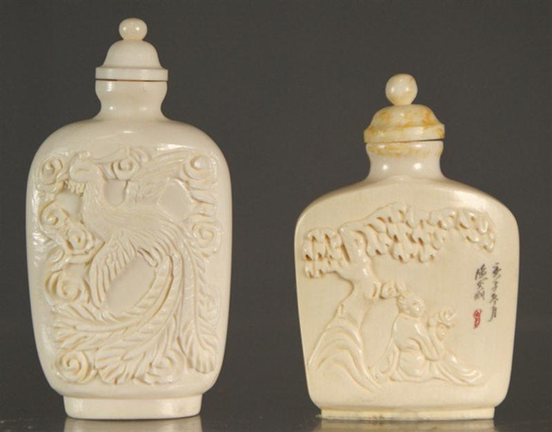(2) carved ivory snuff bottles,