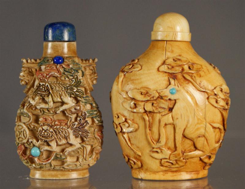  2 carved ivory snuff bottles  3dd53