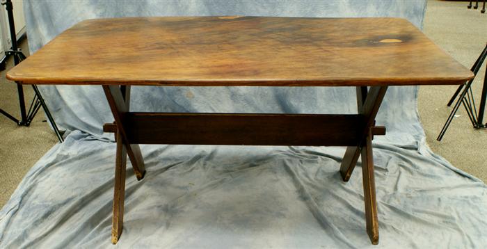 Pine sawbuck table with a later applied