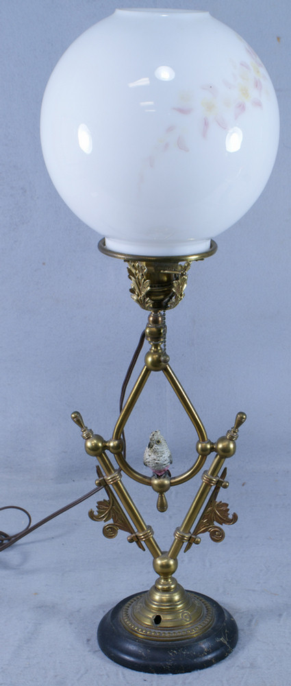 Brass table lamp with painted bird,