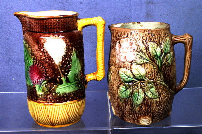 2 majolica pitchers, floral and leaf