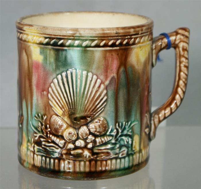 Majolica mug with shell and anchor motif