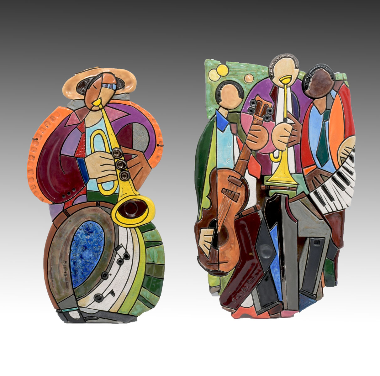 2 SIGNED ENAMELED MUSICIAN WALL