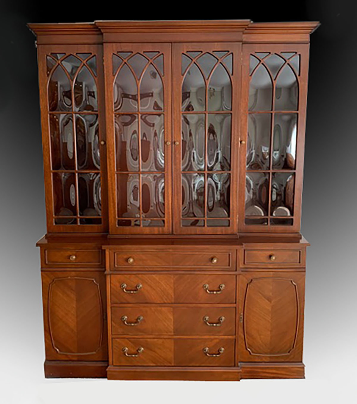 A FORMAL MAHOGANY BREAKFRONT BUBBLE