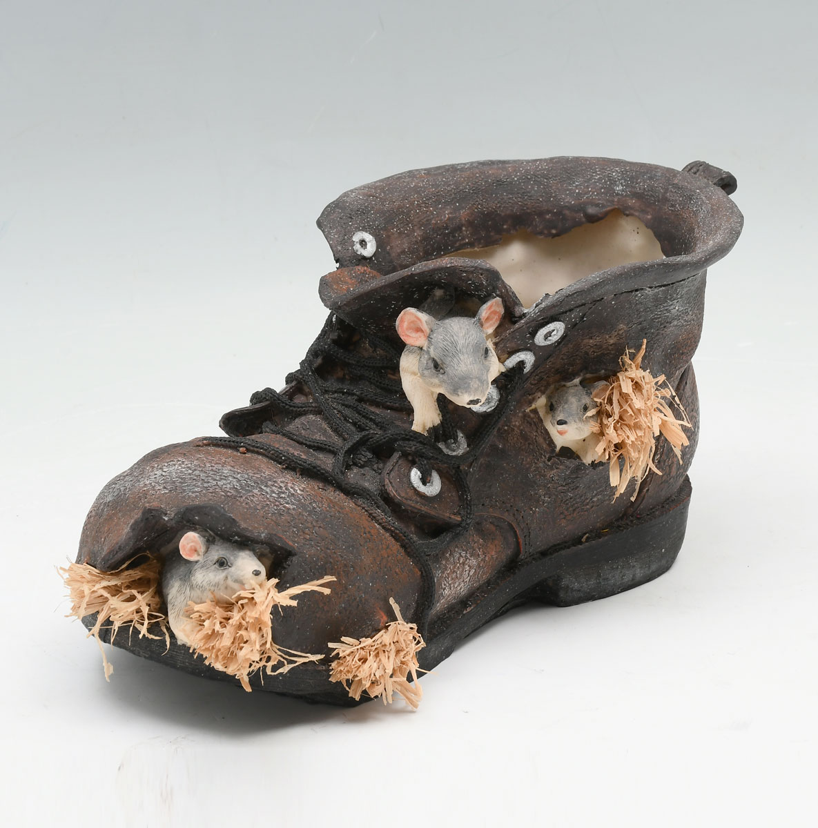 CAST OLD SHOE SCULPTURE WITH MICE