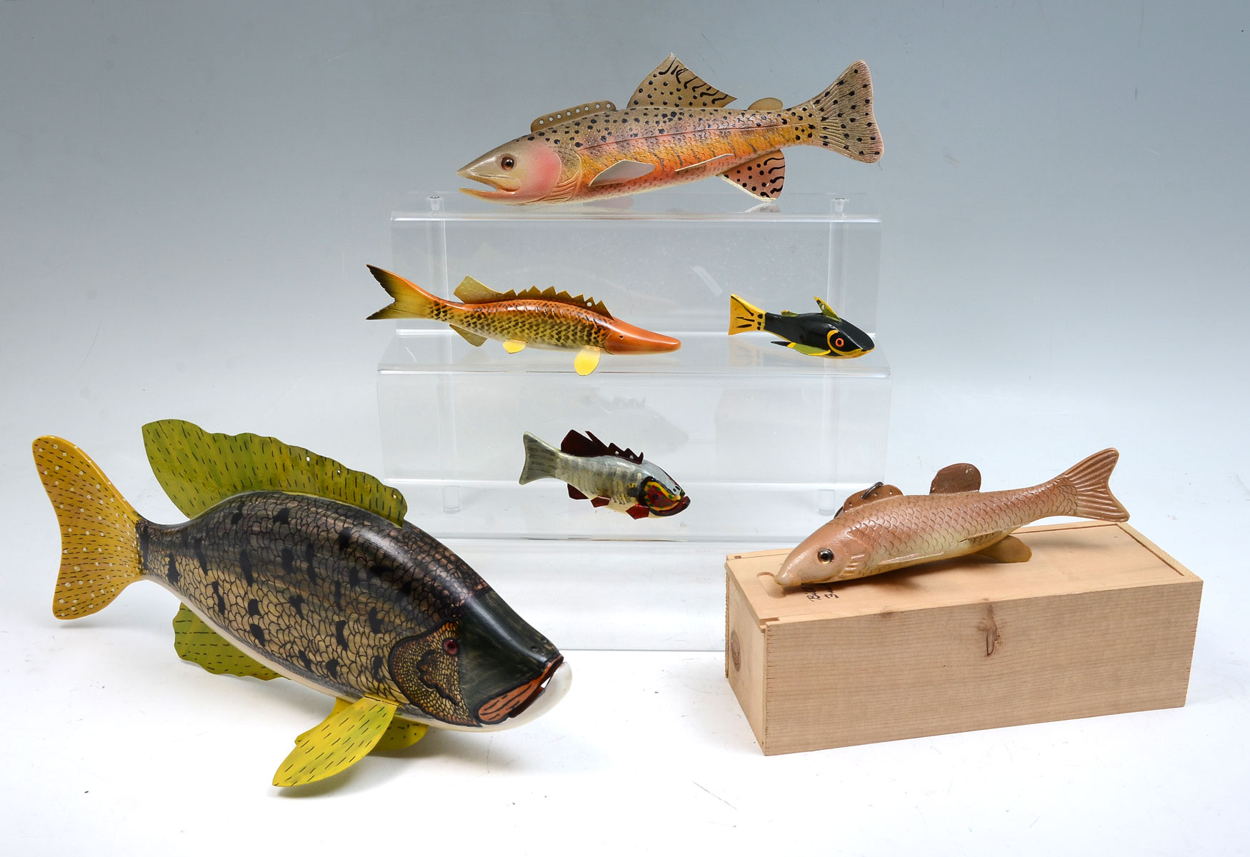 SIX HAND-CARVED AND PAINTED FISH