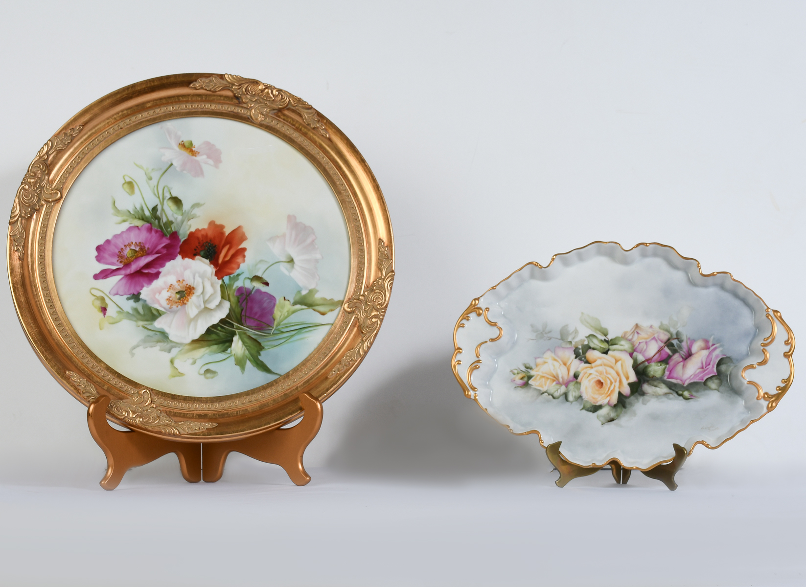 TWO CAROLE SCOTT PAINTED PORCELAIN