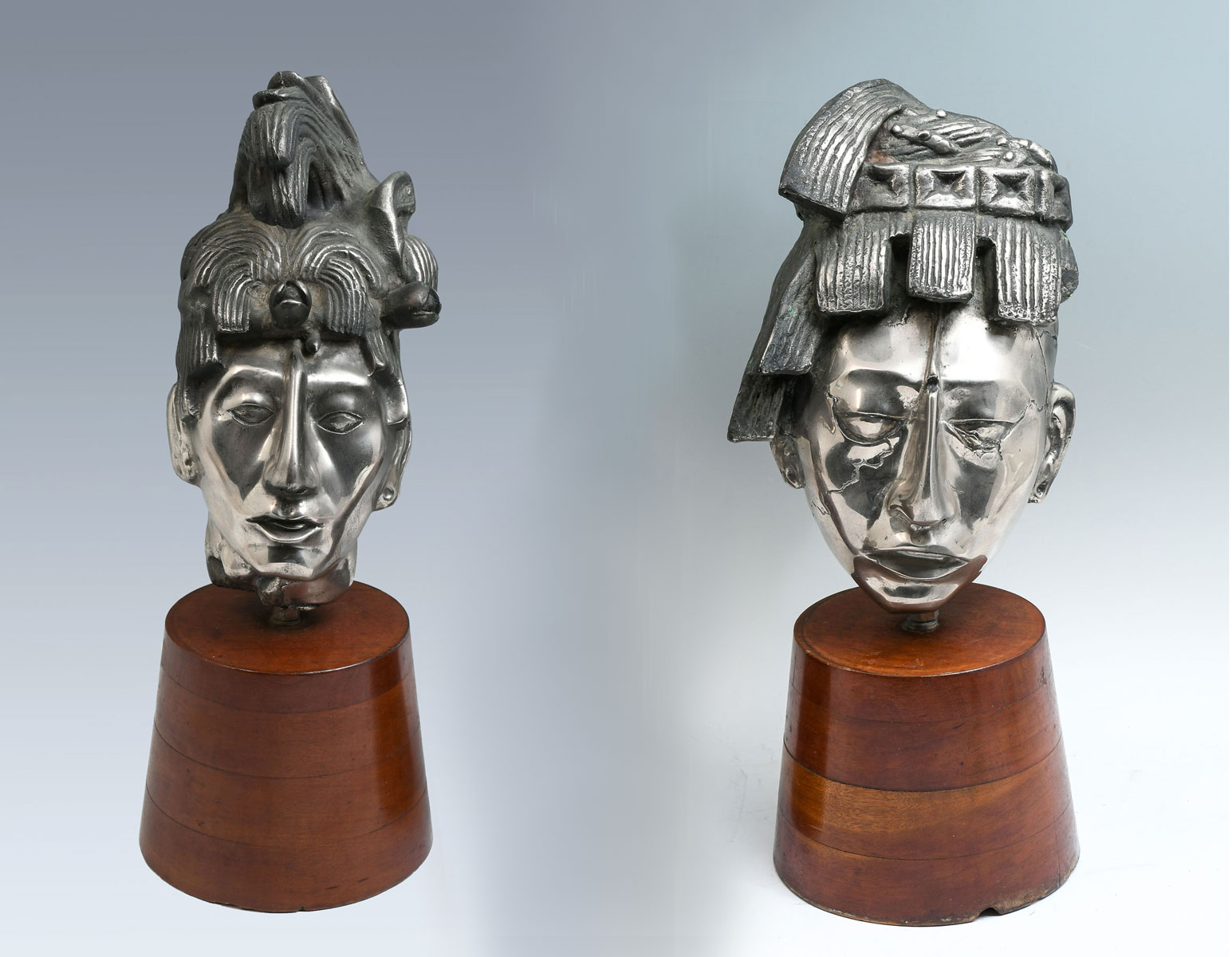 TWO SILVER CLAD TRIBAL BUSTS MAYAN/AZTEC?: