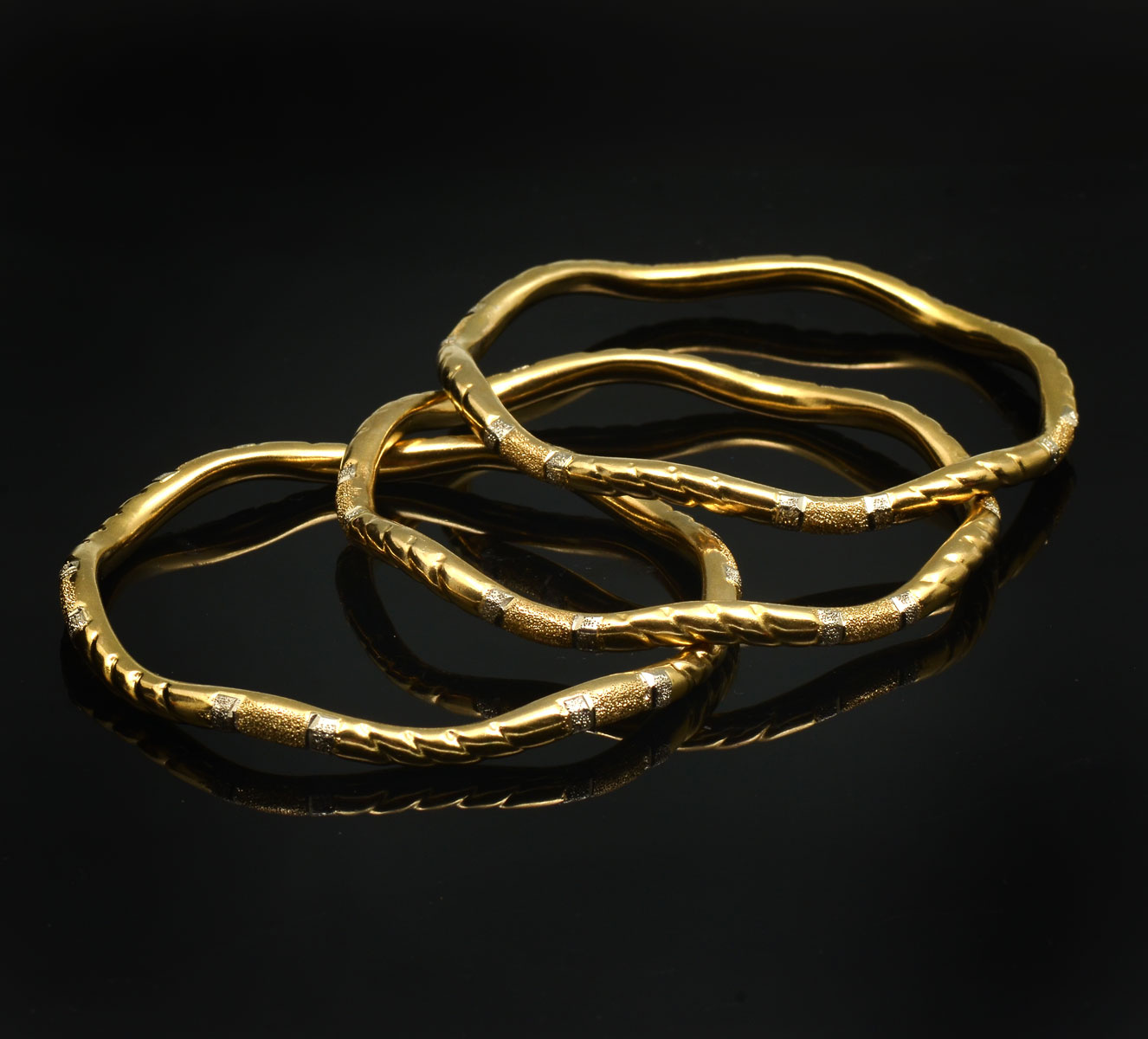 3 - 18K TWO TONED TEXTURED BANGLES: