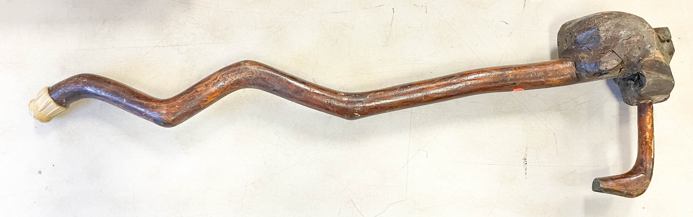 Primitive crooked branch walking stick