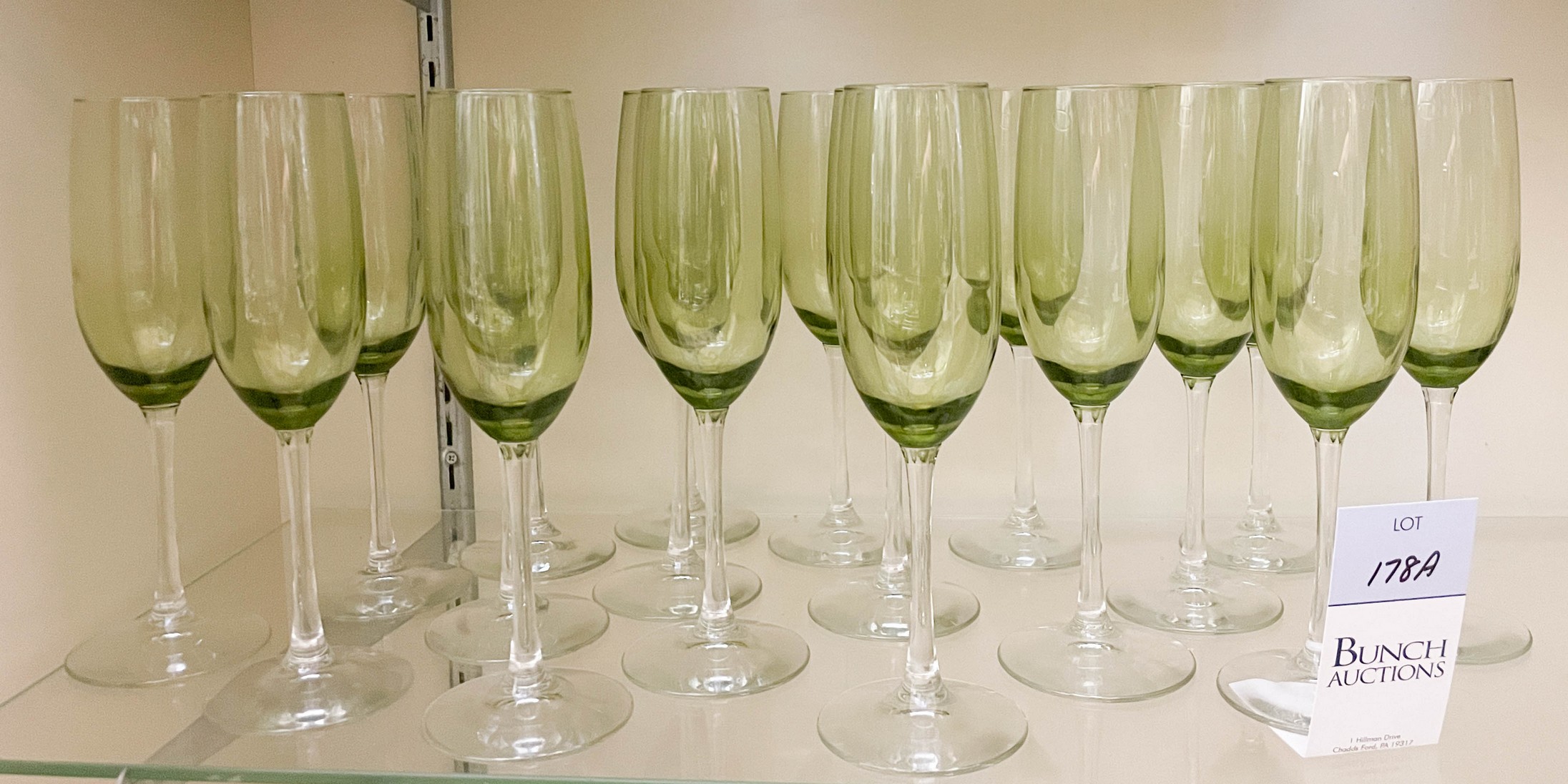 (18) Crystal champagne flutes, olive
