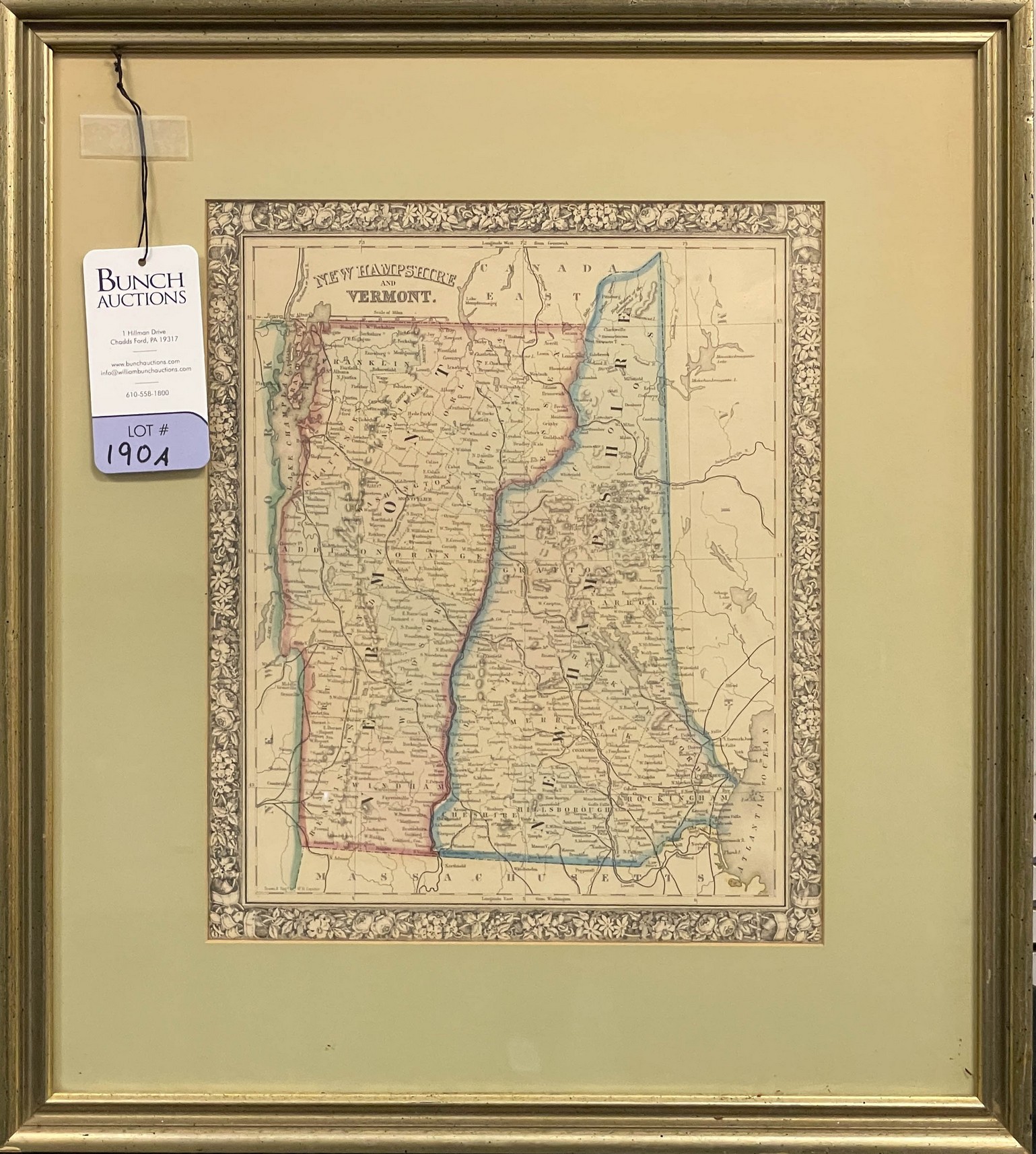 A hand colored framed map of Vermont