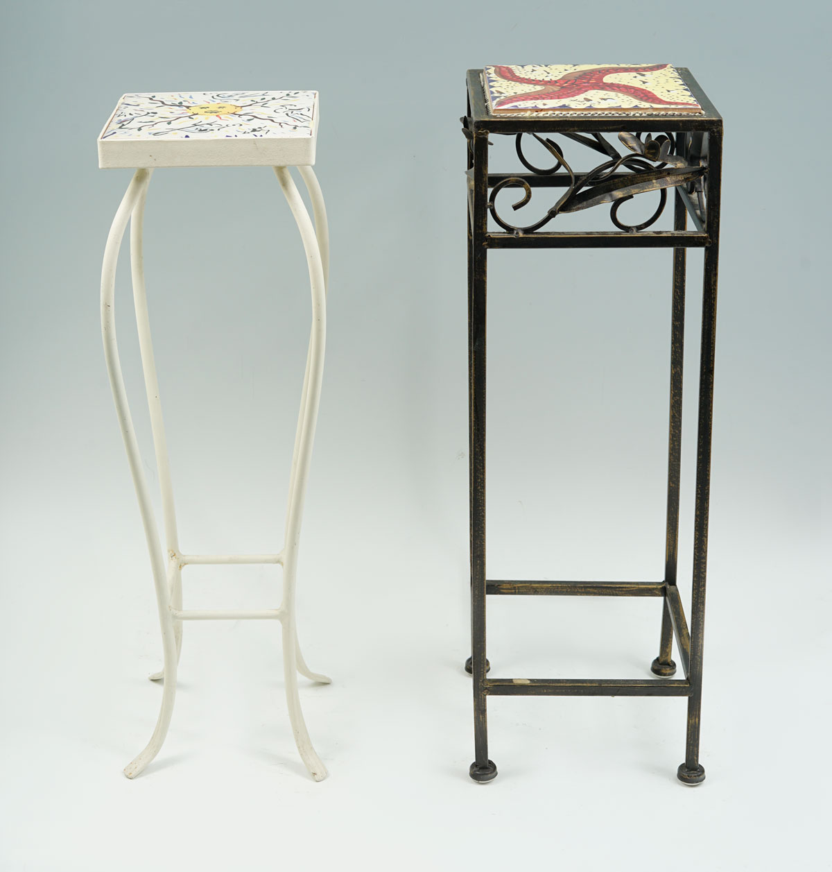TWO SALVADOR DALI TILE-TOP STANDS: