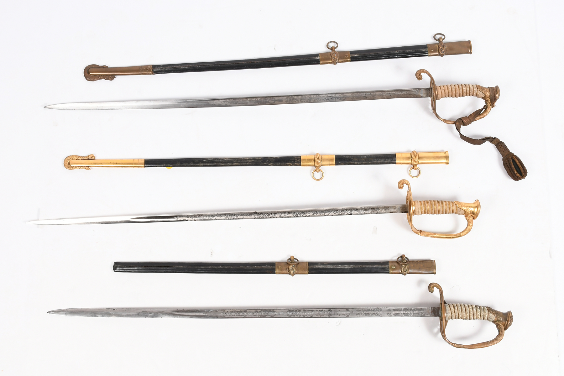 THREE US NAVY OFFICER SWORDS: 1)