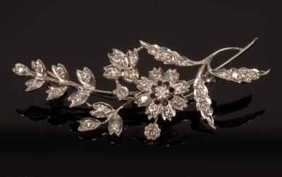 A diamond flower spray brooch set