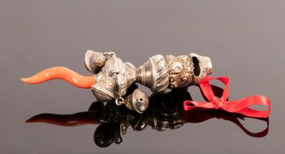 A Victorian silver and coral rattle/teether,