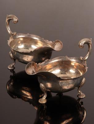 A pair of George II silver sauce