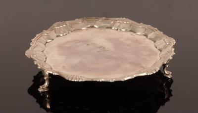 A George II silver card waiter,