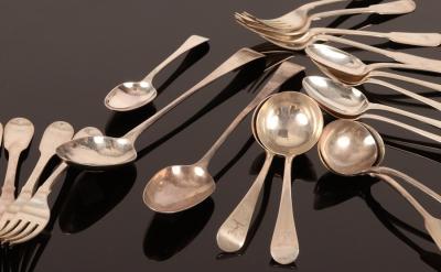 A quantity of silver flatware bearing