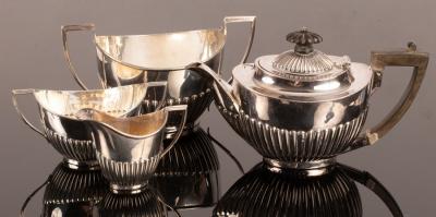 A bachelors silver tea set, the teapot