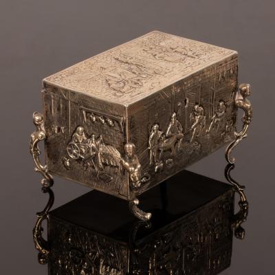 A Continental white metal casket,