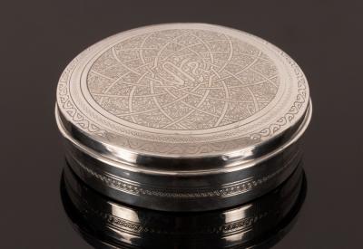An Egyptian silver circular box 279658