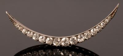 A Victorian crescent brooch, of