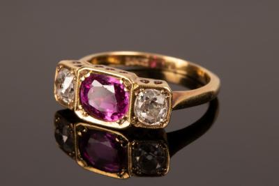 A ruby and diamond three stone 279698