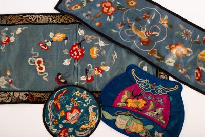 Four Chinese silk embroidered panels,