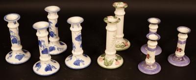 Poole Pottery, six assorted candlesticks,