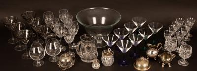 A collection of cut glass, wine,