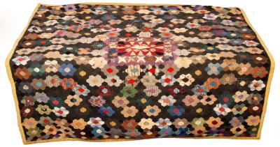 A Victorian patchwork quilt finely 27972c