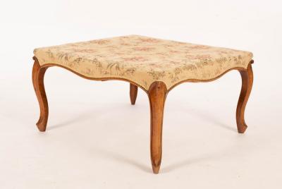 A Victorian walnut square stool