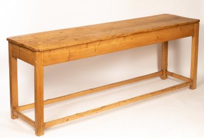 A pine serving table on square