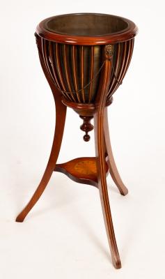 An Edwardian mahogany slatted jardini re  279788